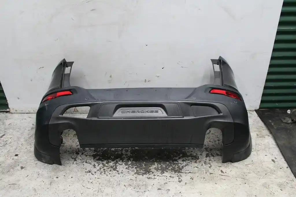 Used Jeep, Cherokee Rear Bumper Kl Bumper Bar (3 Piece) Trailhawk W/ Park Sensor Type 02/14 03/18 2015 – image 1 - All Good Parts