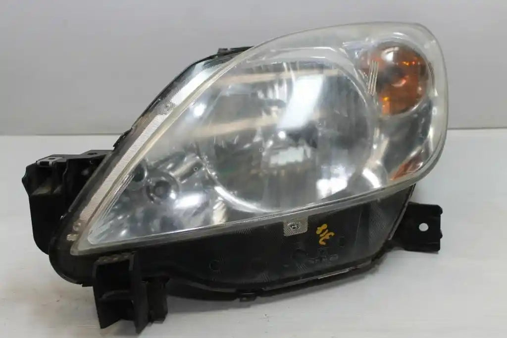 Used Mazda, 2 Left Headlamp Dy2 Series Manual Adjust Type Lens# 5548 06/05 08/07 2006 – main images - All Good Parts