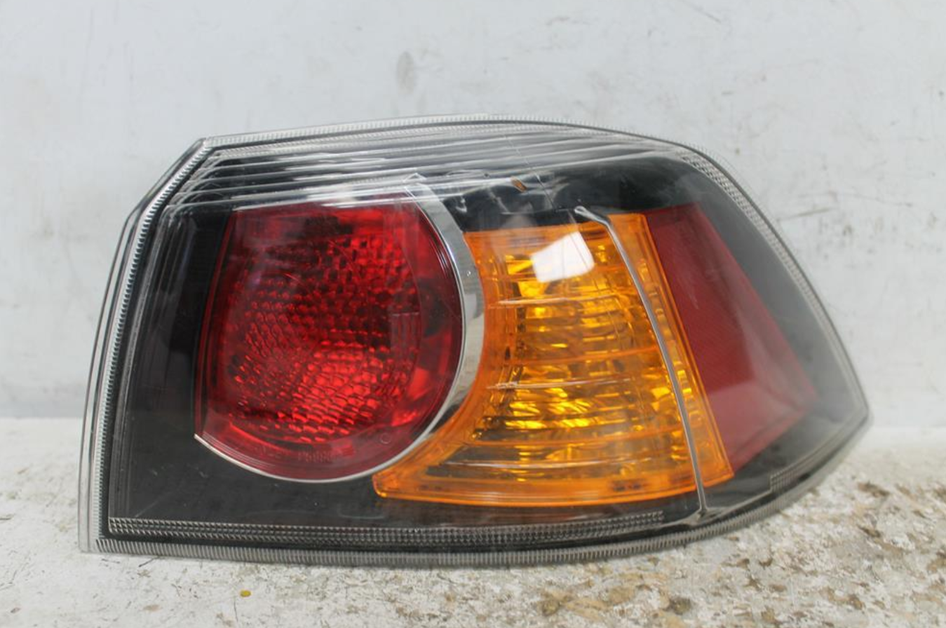 Used Mitsubishi, Lancer Right Taillight Cj Cf Sedan Black Insert Type 07/07 12/17 2013 – image 1 - All Good Parts