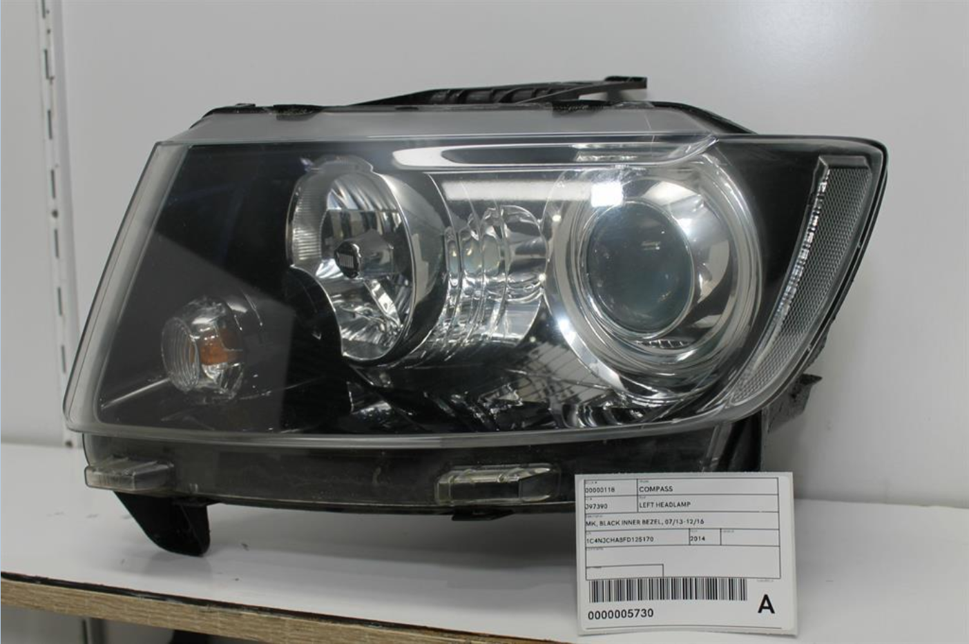 Used Jeep, Compass Left Headlamp Mk Black Inner Bezel 07/13 12/16 2014 – image 1 - All Good Parts