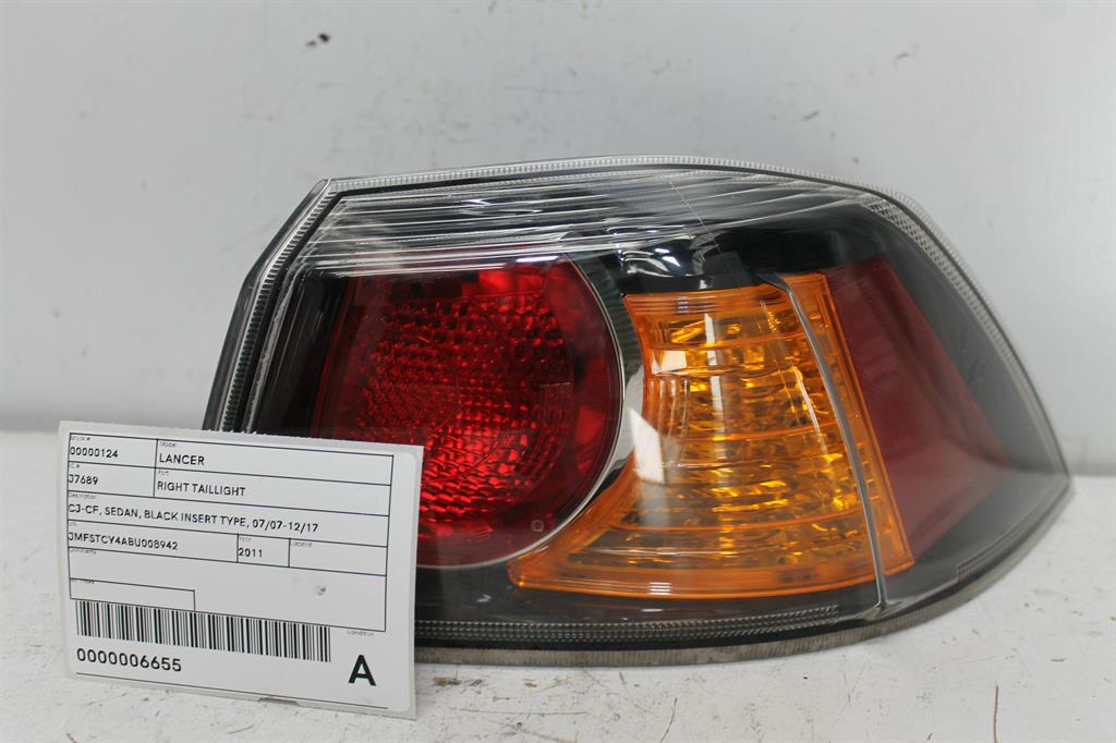 Used Mitsubishi, Lancer Right Taillight Cj Cf Sedan Black Insert Type 07/07 12/17 2011 – image 1 - All Good Parts